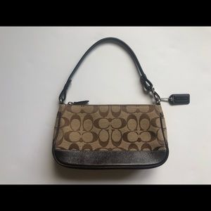 Small Coach purse. Signature C print. Brown & tan